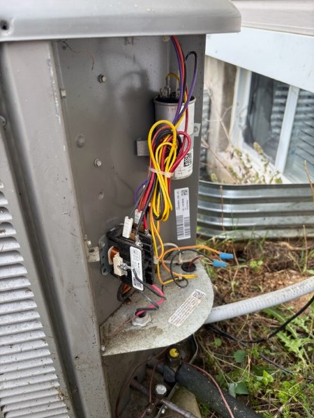 Same outdoor AC electrical panel cleaned, with capacitor, contactor, and wiring exposed
