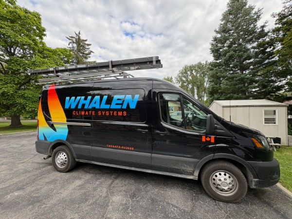 Black Whalen Climate Systems service van with roof ladders and TSSA marking